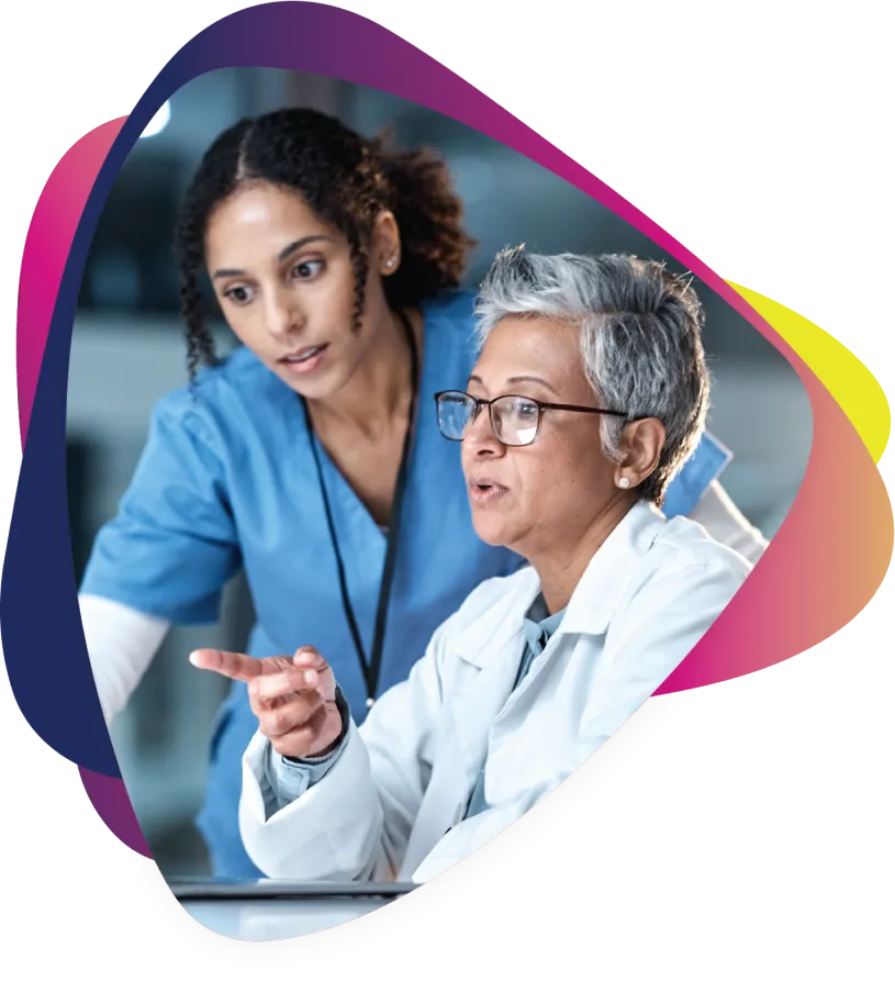 Two healthcare providers viewing information